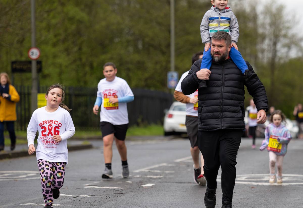Families running the 2K Family Fun Run